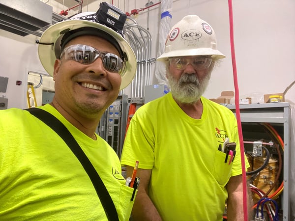 Two Happy Electricians